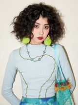A slim-fit, color-blocked, close-knit turtleneck base layer shirt with a versatile Cuban collar and long sleeves.