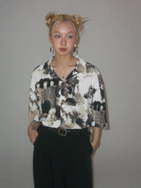 Cuban-style loose and breathable short-sleeved shirt with black and white portrait blur print.
