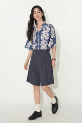 Wool blend short pants with pleated and segmented flat pocket design