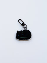 hunched cat keyring
