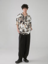 Cuban-style loose and breathable short-sleeved shirt with black and white portrait blur print.