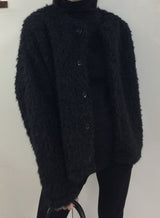 パフオーバーブークレカーディガン