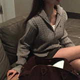 [BELLIDE MADE] ペンダント付きケーブルニットジップアップ