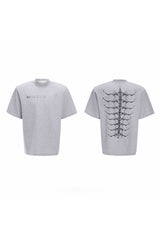 スタッディドエンブロイダードスパインコットンTシャツ