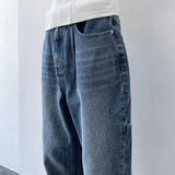 Flared Washed Denim Trousers