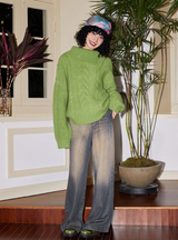 Relaxed and retro collarless sweater with a laid-back vibe
