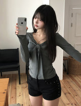 ヒナシャーリングタイリボン長袖Tシャツ