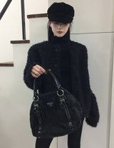 パフオーバーブークレカーディガン
