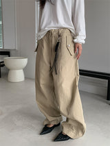 CURVED TUCK COTTON TROUSER