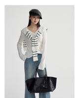 V-neck flared sleeve knit top