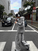 Outside track over hoodie