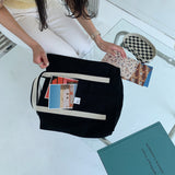 White on black tote bag