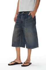 Distressed Pleated Denim Shorts