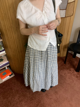 Flow check skirt