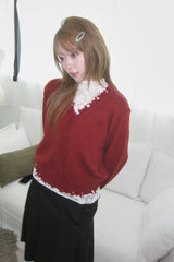 Rough damaged cardigan