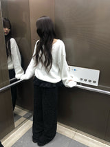 ナンシーヘンリーネックボタンラウンドパッチウールニット
