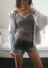 FRINGE DENIM SHORTS