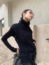 タートルネックツイストストラップスリーブレスニットウェア