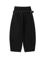 Pale studded strap pants