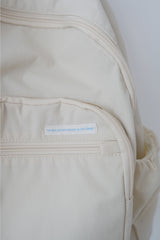 an everywhere daypack, cream beige