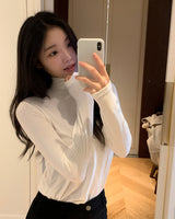 Naika タートルネックTシャツ