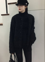 パフオーバーブークレカーディガン