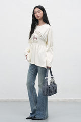 out pocket shoulder bag