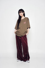 25SS ONE POINT LOGO COLORING WIDE TRACK PANTS BURGUNDY