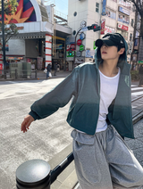 Arc-in-crop windbreaker