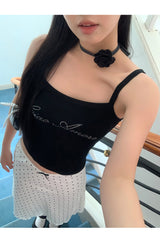 Marshmallow beaded black sleeveless top