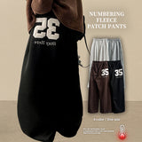 Kello 35 patch embroidered pin tuck wide pants