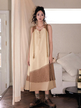 A long, loose and slimming knitted dress for a niche market.