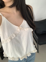 ローランフリルスリーブレスブラウス