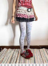 Escape Paradise Loveplayshop - A niche design featuring Y2K prints and irregular graffiti, with a full coverage of unique patterns on the silk stockings.