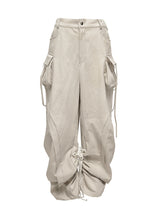  CUT OUT STRING CAGO PANTS . DRITY BEIGE
