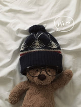 pompon Nordic knit cap