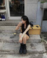 Bell sleeveless top