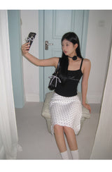 Marshmallow beaded black sleeveless top