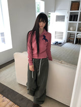 バタンポニースリムフィットロングスリーブティーシャツ