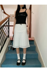 Marshmallow beaded black sleeveless top