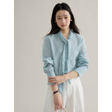 French ribbon tie V-neck blouse