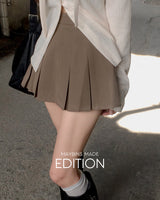 MADE. Rua pleated mini skirt with built-in shorts