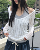 Tida oversized-fit punching see-through long-sleeved knitwear