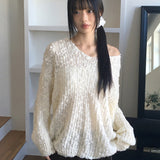 chope snowflake wool loose-fit boat neck boukle knitwear