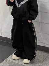 カモパネルパイピングスウェットパンツ