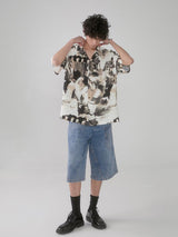 Cuban-style loose and breathable short-sleeved shirt with black and white portrait blur print.