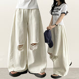 knee damage cutting wide pants