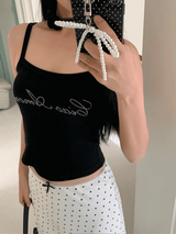 Marshmallow beaded black sleeveless top