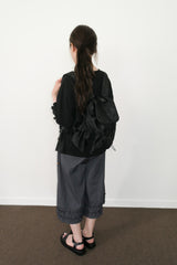 dot string pocket backpack