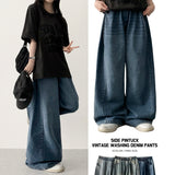 Rize waistbanding side pin tuck incision denim washed wide pants